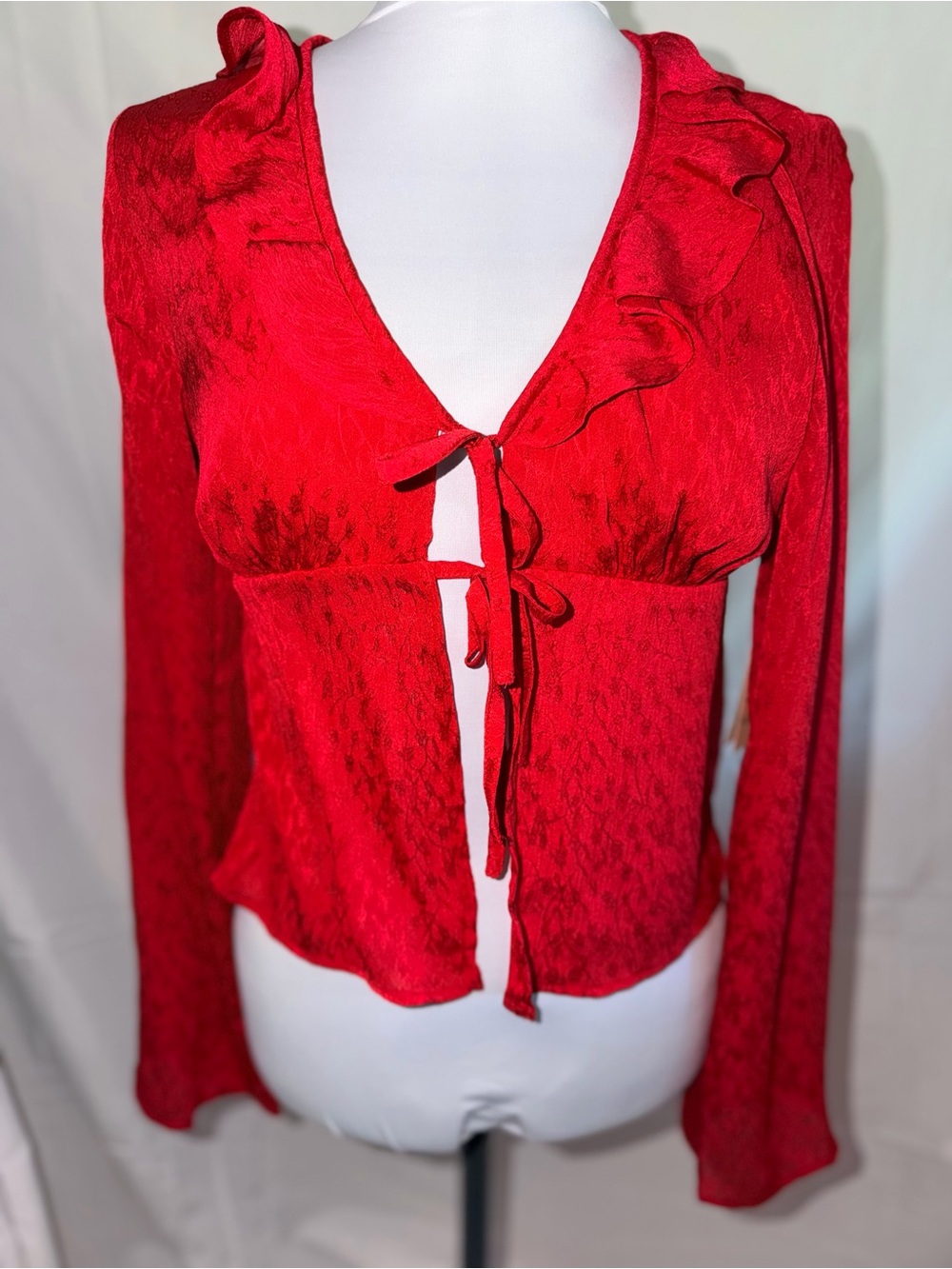 Red Ruffle Tie-Front Blouse with Rosette Print